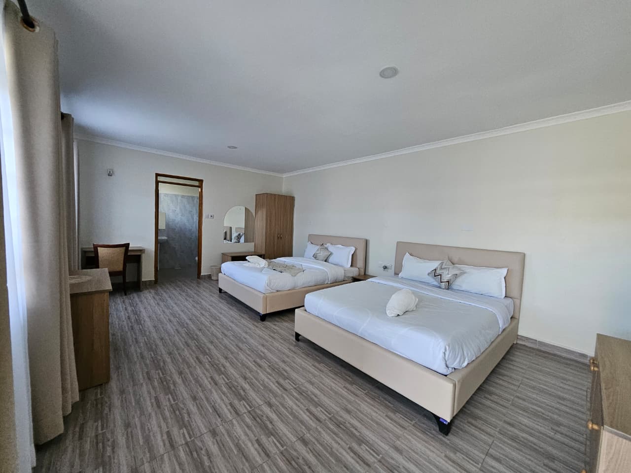 Twin bed hotel room in Naivasha